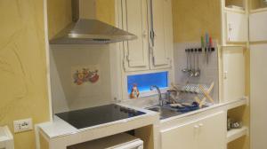 Kuchyňa alebo kuchynka v ubytovaní B&B In Piazza