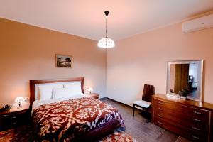 Ένα ή περισσότερα κρεβάτια σε δωμάτιο στο Melies Hotel