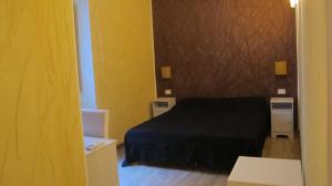 Posteľ alebo postele v izbe v ubytovaní B&B In Piazza