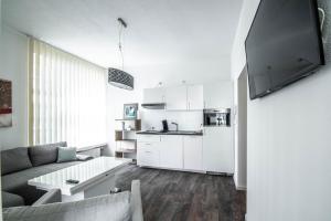 Kuchyň nebo kuchyňský kout v ubytování Central Apartments Aalen
