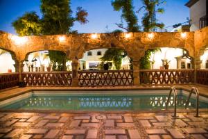 A piscina em ou perto de Hotel Cosmos Don Carlos