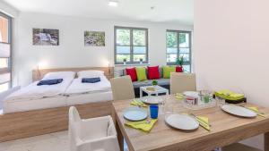 Posteľ alebo postele v izbe v ubytovaní Apartmán A Harrachov
