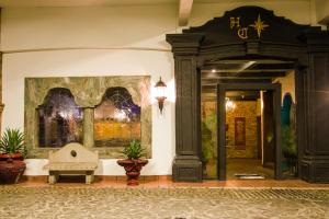 A fachada ou entrada de Hotel Cosmos Don Carlos