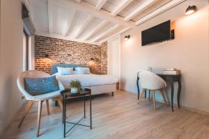 TV a/nebo společenská místnost v ubytování B&B Hof Ter Koningen