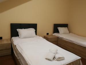 Postel nebo postele na pokoji v ubytování Favourite