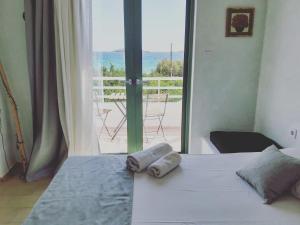 Postel nebo postele na pokoji v ubytování Filio Guesthouse