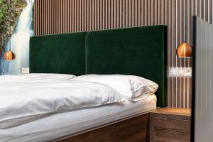 Posteľ alebo postele v izbe v ubytovaní Apartment Tiliana