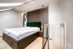 Posteľ alebo postele v izbe v ubytovaní Apartment Tiliana