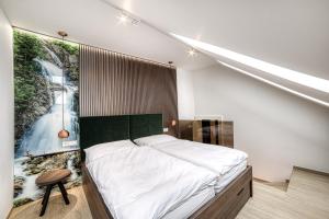 Posteľ alebo postele v izbe v ubytovaní Apartment Tiliana