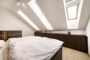 Posteľ alebo postele v izbe v ubytovaní Apartment Tiliana