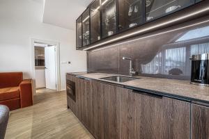 Kuchyňa alebo kuchynka v ubytovaní Apartment Tiliana