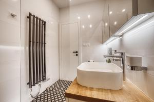 Kúpeľňa v ubytovaní Apartment Tiliana + 37 fotografií
