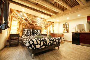 Posteľ alebo postele v izbe v ubytovaní LOCBNB - TOURISM and BUSINESS LOCATIONS - ALSACE - BARR CENTRE - ROUTE DES VINS