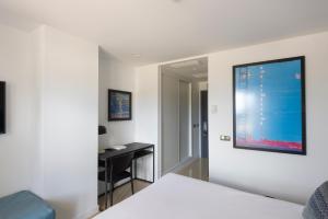 TV a/nebo společenská místnost v ubytování Hotel Tahiti