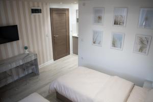 Ένα ή περισσότερα κρεβάτια σε δωμάτιο στο Apartmani Jović