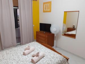 TV a/nebo společenská místnost v ubytování OCEAN VIEW Quartos