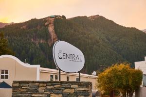a sign that says central in front of a mountain at The Central Hotel Queenstown, A Naumi Chapter in Queenstown +53 photos