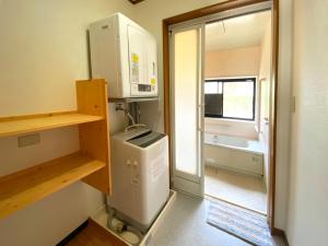 Kuchyň nebo kuchyňský kout v ubytování Yufuin Onsen Hasuwa Inn