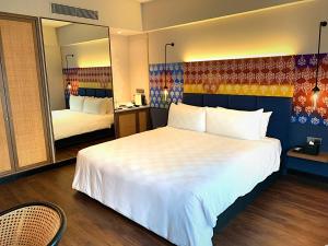 Postel nebo postele na pokoji v ubytování Hotel Maya Kuala Lumpur City Centre