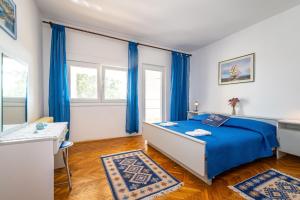 Postel nebo postele na pokoji v ubytování PALMA