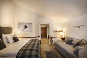 Ένα ή περισσότερα κρεβάτια σε δωμάτιο στο VALAMAR Obertauern