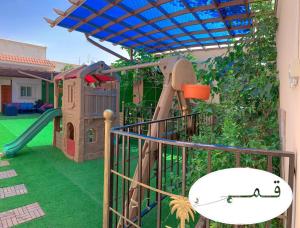 Ο χώρος παιχνιδιού για παιδιά στο Shams W Qamar Chalets