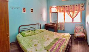 Postel nebo postele na pokoji v ubytování Greenleaf Guesthouse