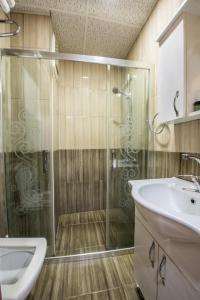 a bathroom with a shower and a sink at Istanbul Sirkeci Hotel in Istanbul