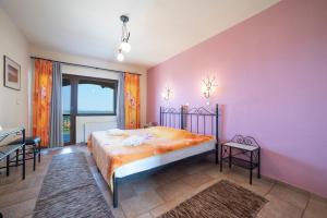 Postel nebo postele na pokoji v ubytování Hotel Erodios