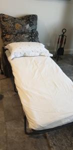 The Bower@ Kings Cottage客房内的一张或多张床位