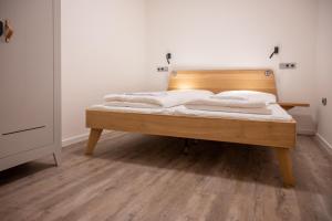 Posteľ alebo postele v izbe v ubytovaní ART Hostel & Apartments
