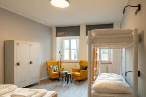 Posteľ alebo postele v izbe v ubytovaní ART Hostel & Apartments