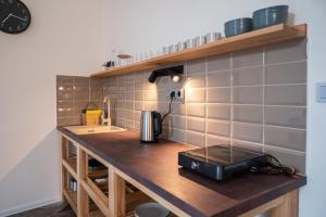 Kuchyňa alebo kuchynka v ubytovaní ART Hostel & Apartments