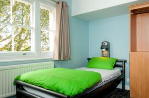 Postel nebo postele na pokoji v ubytování YHA Stratford-Upon-Avon