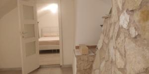 Postel nebo postele na pokoji v ubytování Duplex Itri