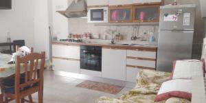 Kuchyň nebo kuchyňský kout v ubytování Duplex Itri + 36 fotografií