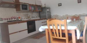 Kuchyň nebo kuchyňský kout v ubytování Duplex Itri