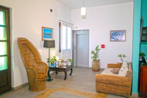 TV a/nebo společenská místnost v ubytování Hotel Merlino