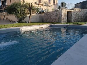 The swimming pool at or close to Chiaralice