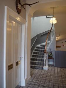 A kitchen or kitchenette at Fairwinds Hotel 