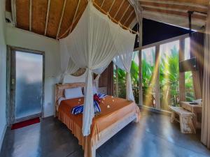 Säng eller sängar i ett rum på Villa Alisha Pererenan Canggu