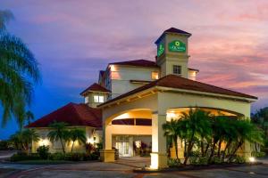 a building with a clock tower on top of it at La Quinta by Wyndham Lakeland West in Lakeland