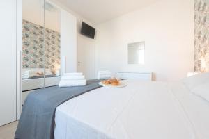 Posteľ alebo postele v izbe v ubytovaní Villa Livia - IsulaTravel