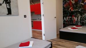 Posteľ alebo postele v izbe v ubytovaní Street Art Apartment