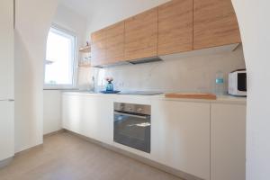 Kuchyňa alebo kuchynka v ubytovaní Villa Livia - IsulaTravel