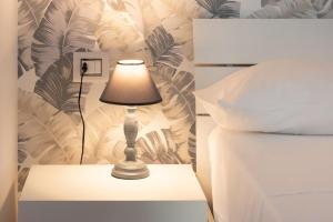 Posteľ alebo postele v izbe v ubytovaní Villa Livia - IsulaTravel