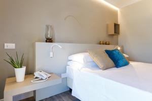 Voodi või voodid majutusasutuse Seawater Hotel Bio & Beauty Spa toas