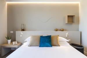 Voodi või voodid majutusasutuse Seawater Hotel Bio & Beauty Spa toas
