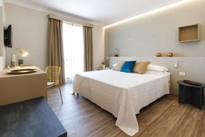 Voodi või voodid majutusasutuse Seawater Hotel Bio & Beauty Spa toas