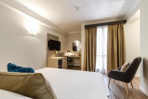 Voodi või voodid majutusasutuse Seawater Hotel Bio & Beauty Spa toas